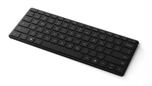 Pair a Bluetooth keyboard with Windows: Use separate pairing slots on Designer Compact