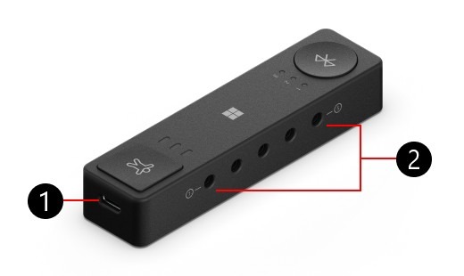 Microsoft illustrates the Adaptive Hub charging connection and its assistive-switch sockets.